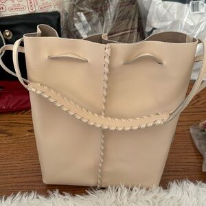 Feed project leather cream bucket bag. Never used